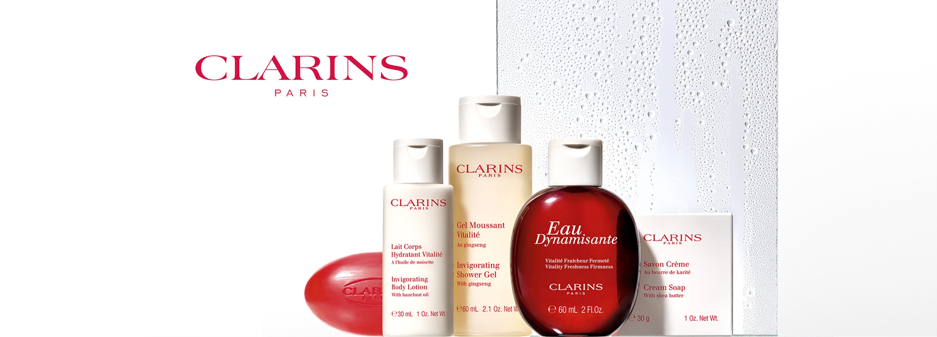clarins bathroom products with wet wall and logo
