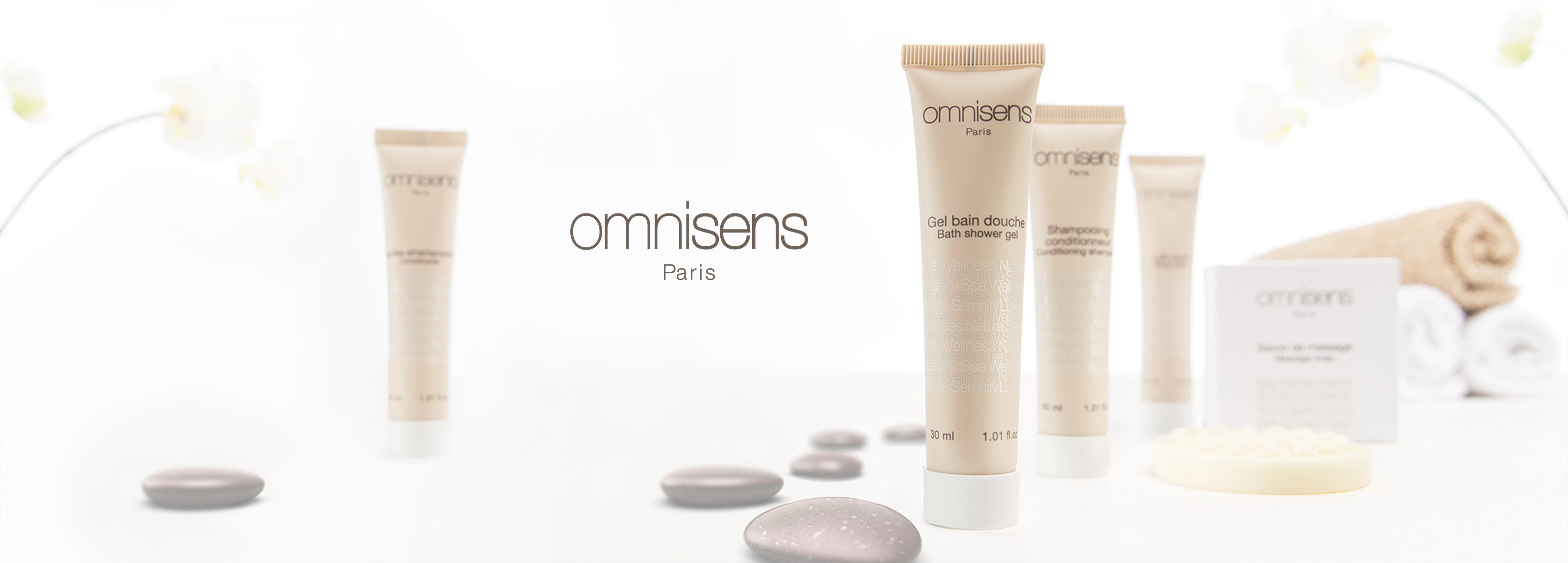 omnisens paris bathroom products and pebbles